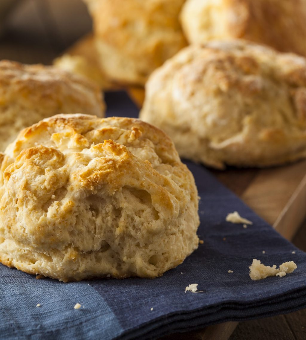 Homemade biscuits on a blue napkin.