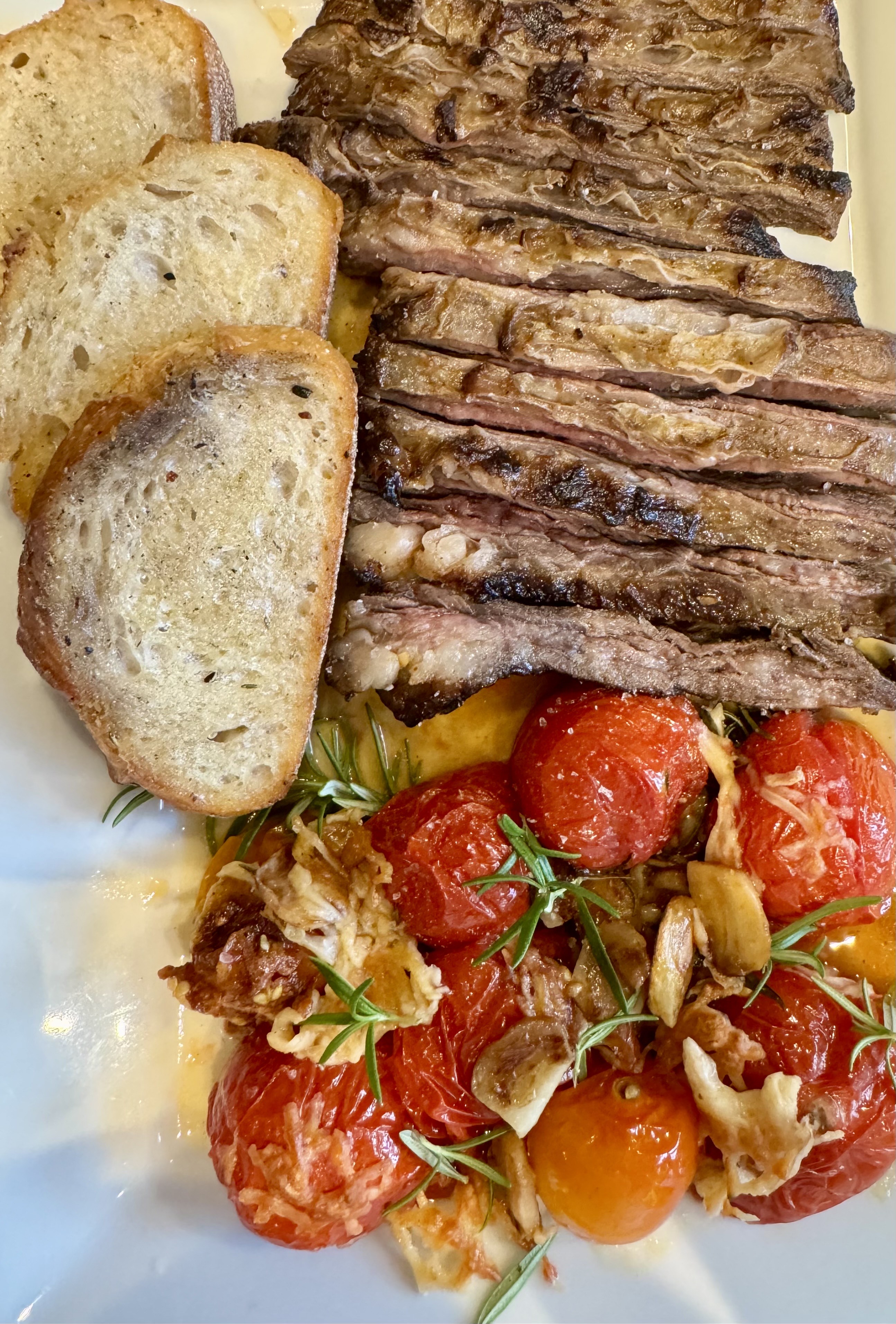 Broiled Tomatoes on the Vine—the absolute best side dish for steak!!
